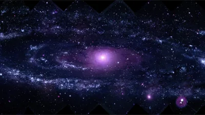 A wide violet galaxy spreads its arms from a pale glowing core, with a smaller bright object flaring at the lower right corner.