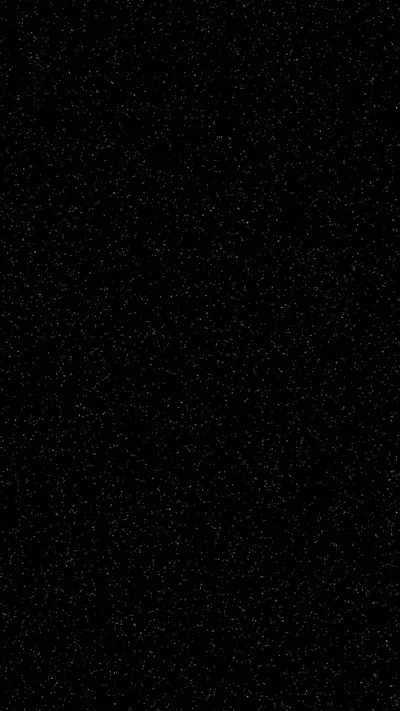Sparse pinpricks of white sit across an almost entirely black frame — close to true #000000 for AMOLED screens.