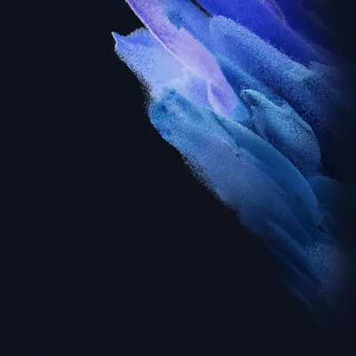 A diagonal spray of blue and lilac particles sweeps down from the top edge toward the right, leaving the lower-left half of the frame in flat black.