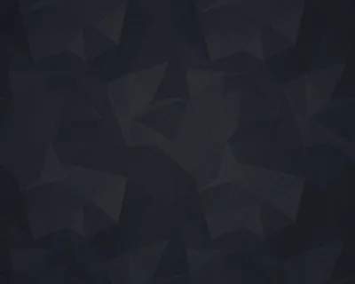 Overlapping charcoal polygons shade a near-black field with barely a tone between them, an even low-contrast pattern that sits quietly behind a full desktop of icons.