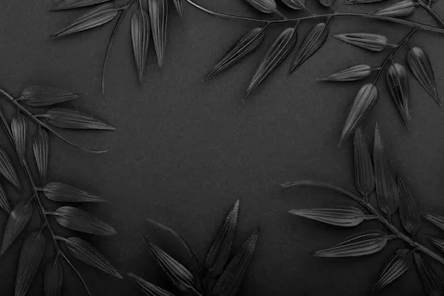 Bamboo sprigs painted matte black frame the top and bottom corners of a textured dark card, the middle deliberately left empty.