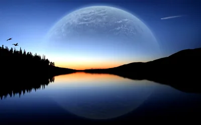 A huge pale moon looms over a twilight lake, birds crossing the upper left while a thin orange band of sunset marks the horizon.