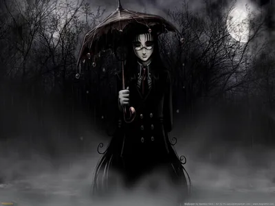 The same masked gothic figure stands in ground mist under a bright full moon, dead trees closing in from both sides of the frame.