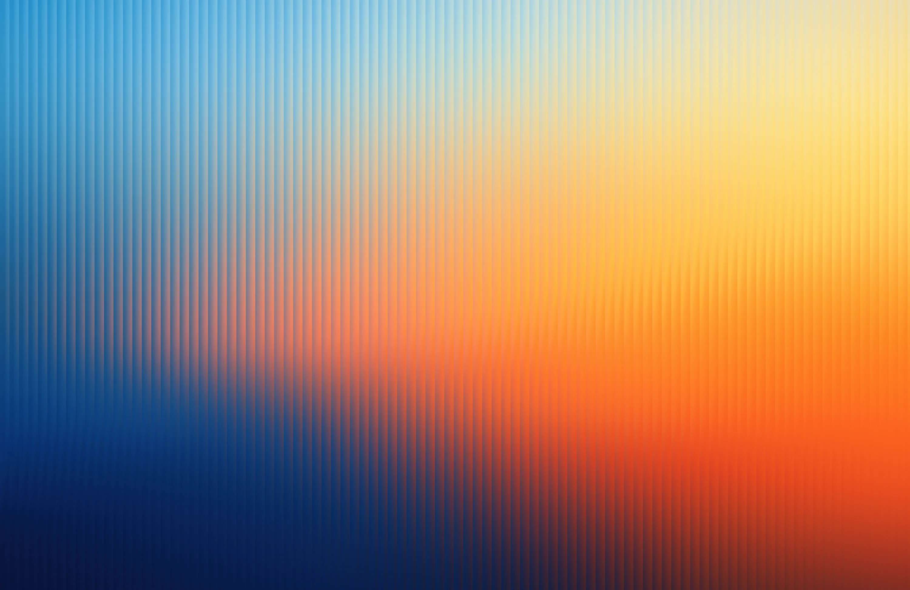 Vertical fluted-glass ridges break a blue-to-orange sunset blend into fine strips, sharpest along the darker left side.