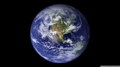 The classic full-disc photo showing North America under swirling cloud, letterboxed by wide black margins above and below that sit well behind desktop icons.