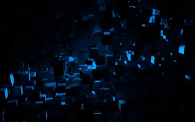 Dozens of small cubes drift across a black field, each one catching blue light on a single face so the rest disappears into shadow.
