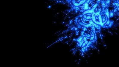 A cluster of blue sparks detonates against the right edge, trails shooting left across a field left completely black.