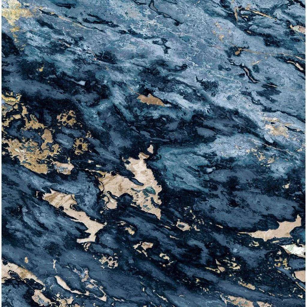 Churning navy and teal stone broken by sandy beige patches scattered across the whole slab, thin white spray tracing the currents between them.