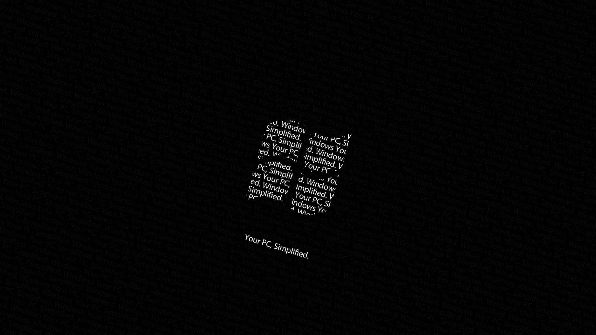Four panes of tiny white type form the Windows mark at the centre of a black screen, with a small caption underneath.