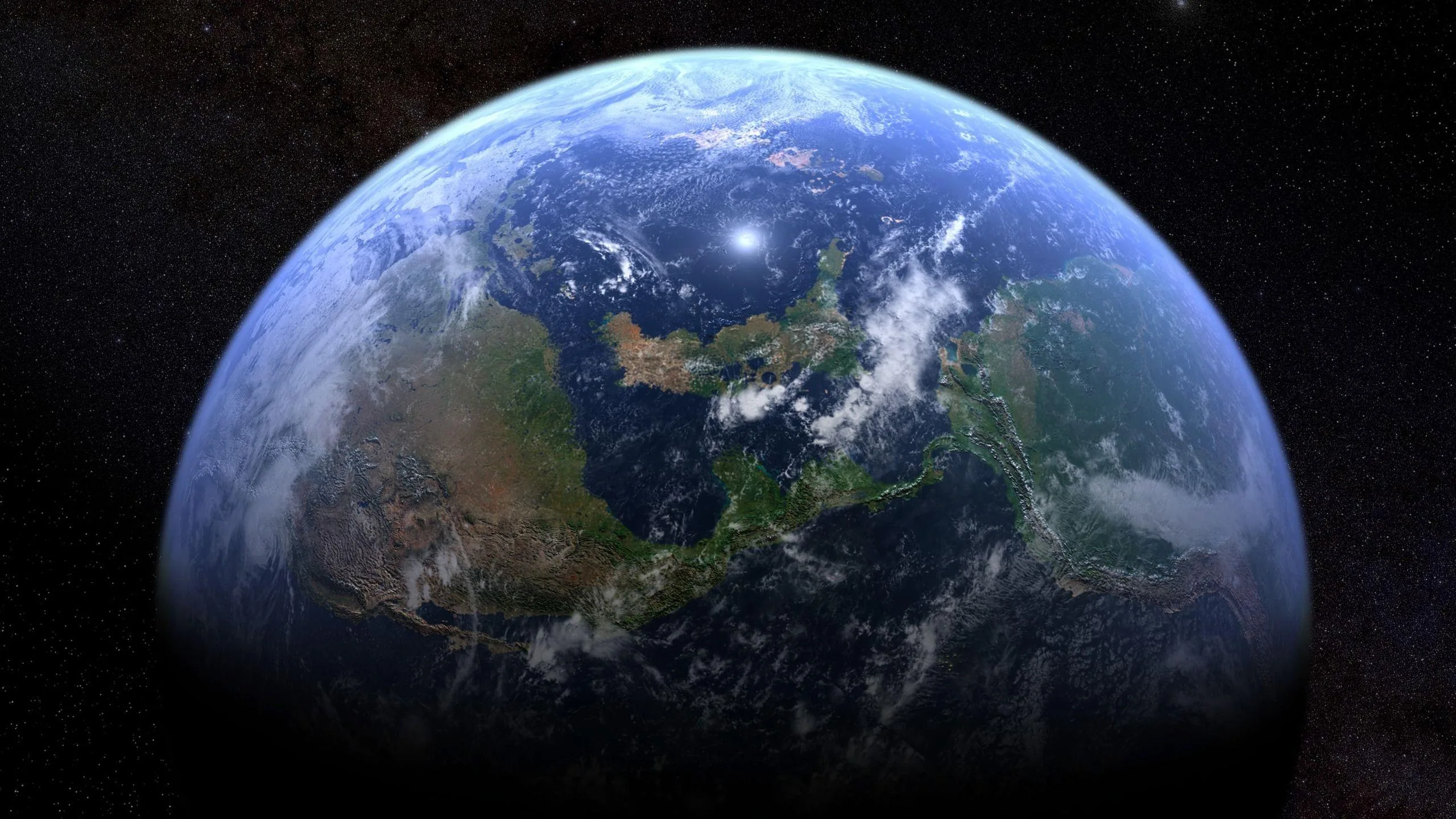Green and tan landmasses show through broken cloud as the globe fills the lower frame, its atmosphere glowing faintly against the black upper corners.