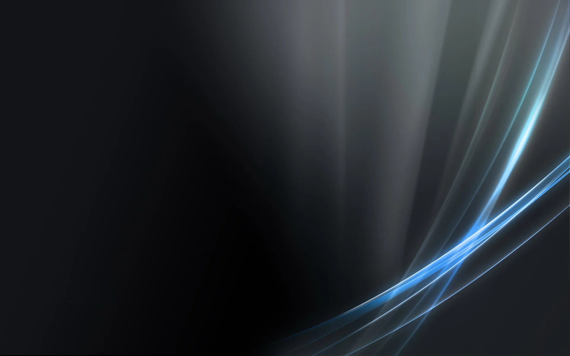 Thin blue and silver streaks sweep up from the bottom right, the rest of the frame left in soft shadow.