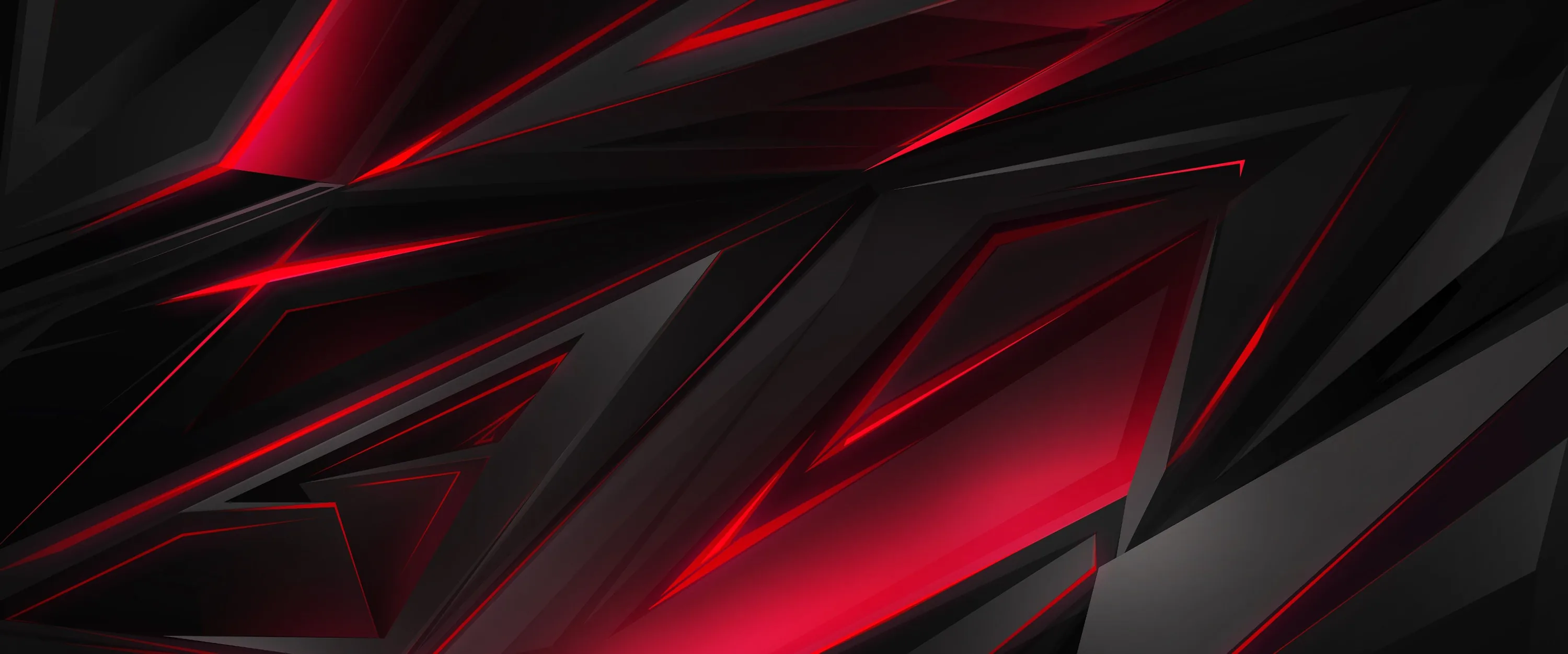 Sharp diagonal planes of matte black overlap in an ultrawide frame, red light catching along every cut edge.
