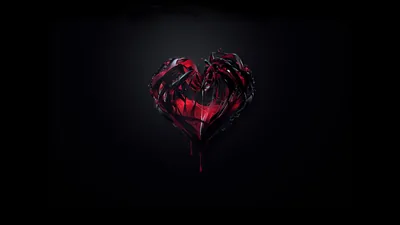 A dark crimson heart of jagged glassy shards floats centred in near-total black, light catching only along its broken facets.