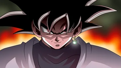 The black-haired face fills this wide frame, glaring down past the viewer, a band of orange fire glowing along the top edge behind his spikes.