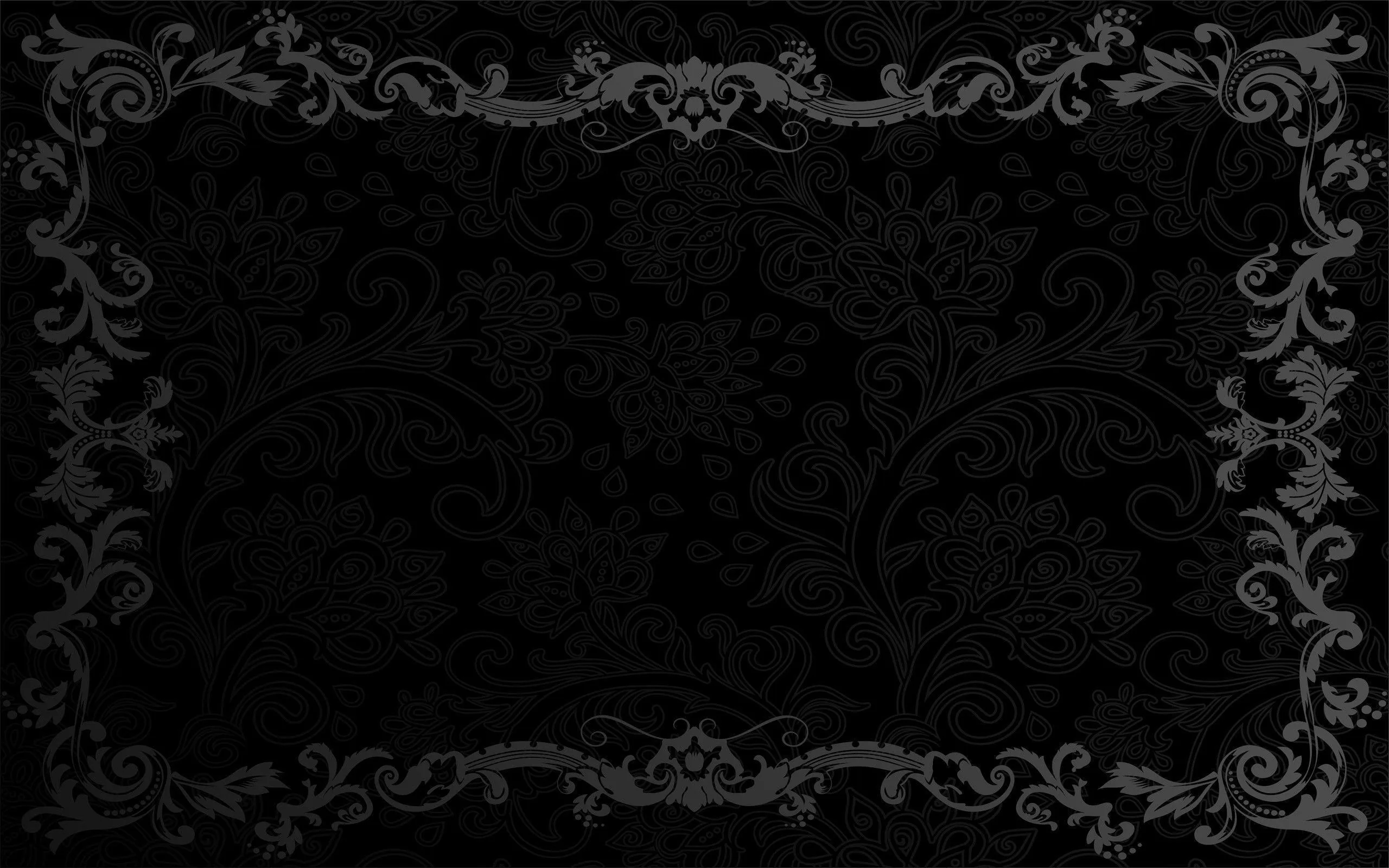 Carved scrollwork forms a border around all four sides, the middle left as a dark panel with a faint pattern behind it.