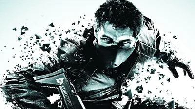 A man in a face wrap lunges forward against a blown-out white sky, black debris flying off his shoulder in hard black and white.