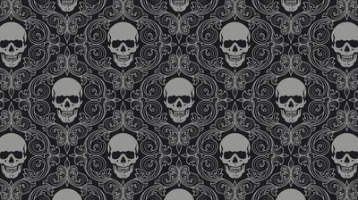 Grey skulls sit in even rows across a dark damask of curling scrollwork, tiling seamlessly in every direction.