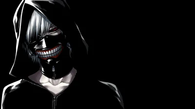 A leather mask with a metal grin and a raised hood, side-lit so the right half of the body disappears entirely into black.