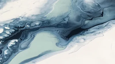 Ash blue ink streams from the top centre toward the right edge, with smaller pools breaking up along the lower left and white haze filling the rest.