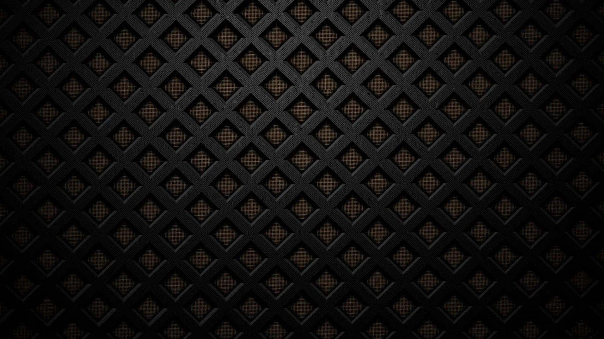 Rows of stitched diamonds run across dark padded material, faint amber light picking out the seams at the centre.