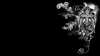 An ornate crest with spread wings and curling vines is engraved in white at the right edge, leaving the left two thirds pure black for icons.