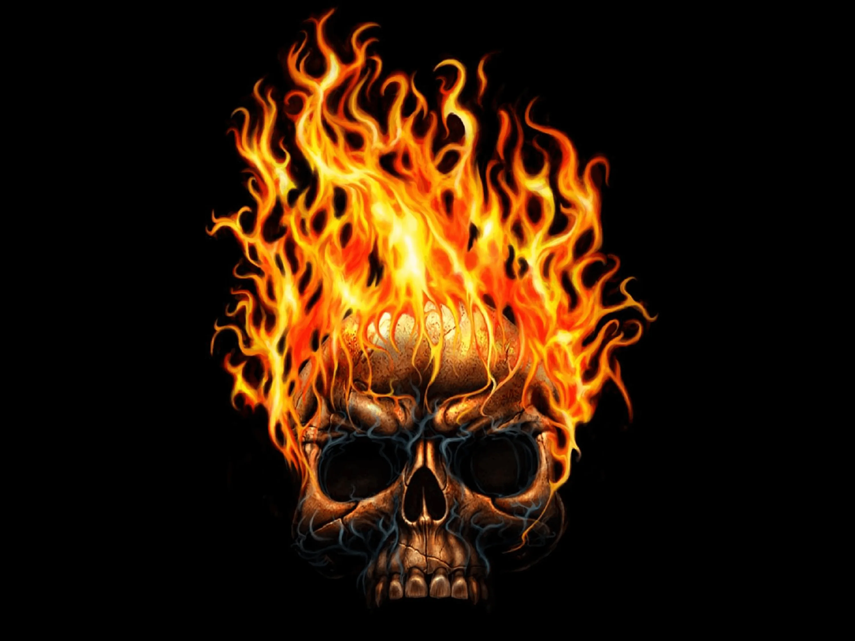 Tall orange flames pour up off a skull's crown and hollow eyes against pure black, the fire lighting the cheekbones from beneath.