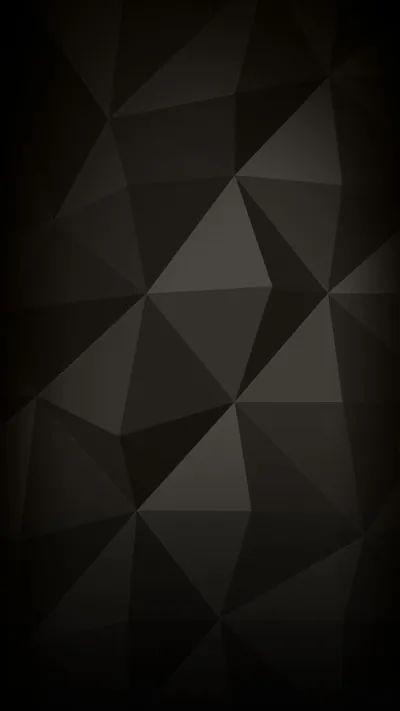 Flat triangular facets tile the whole frame in shades of charcoal, a few lighter panels breaking up the middle.