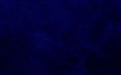 An even wash of dark navy with cloudy lighter patches surfacing near the top — a quiet backdrop with nothing competing for attention.