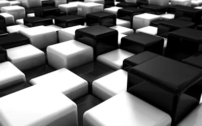 Rounded black and white blocks tile away toward a dark horizon, gloss highlights along their top edges giving each one weight.
