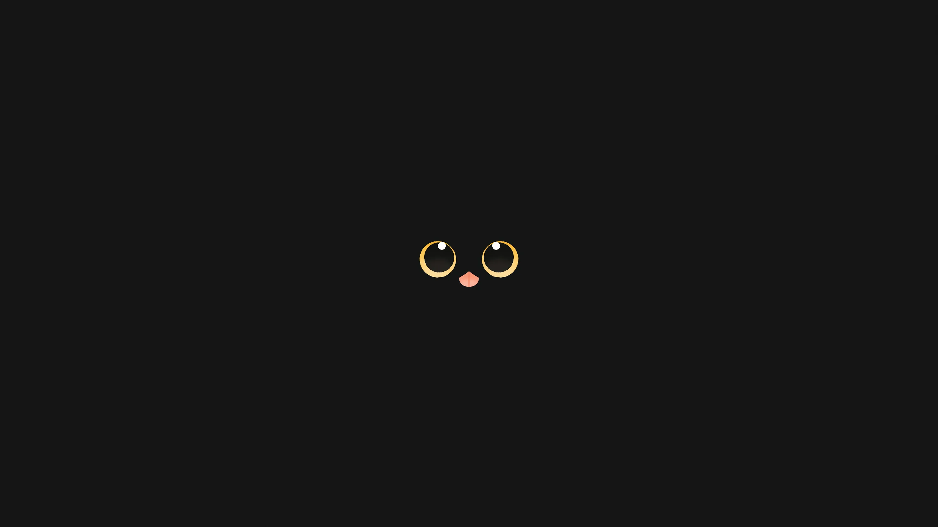 Two amber eyes and a small pink nose float in a black field — nothing else of the cat is visible.