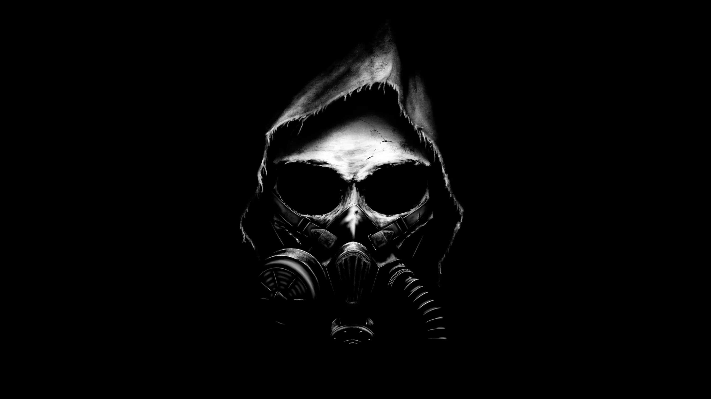 A skull wearing a respirator looks out from under a hood, only the brow and the mask filters catching light before everything drops into black.