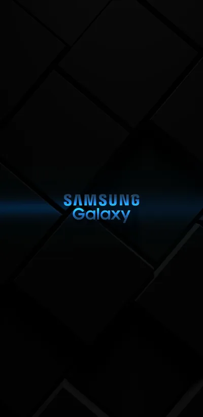 Matte black cubes tile the frame at a slant, lit only by the blue Samsung Galaxy wordmark at centre; near-total black that saves OLED battery.