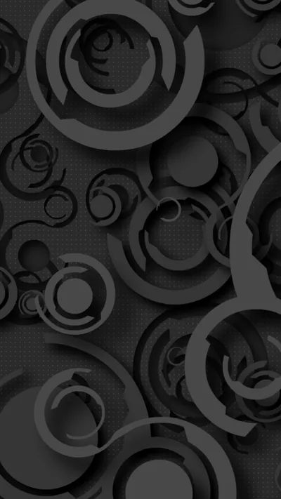 Overlapping rings and discs sit at different depths across a dark grey field, each one raised just enough to cast a soft shadow on the layer beneath.