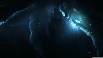 A cold blue nebula opens across the upper half of the frame, its brightest core to the right and dark dust curling underneath.