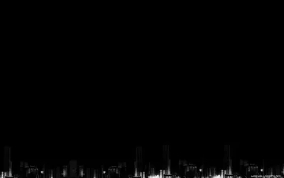 A low band of tower lights and window glow runs along the bottom edge, everything above it solid black for icons.