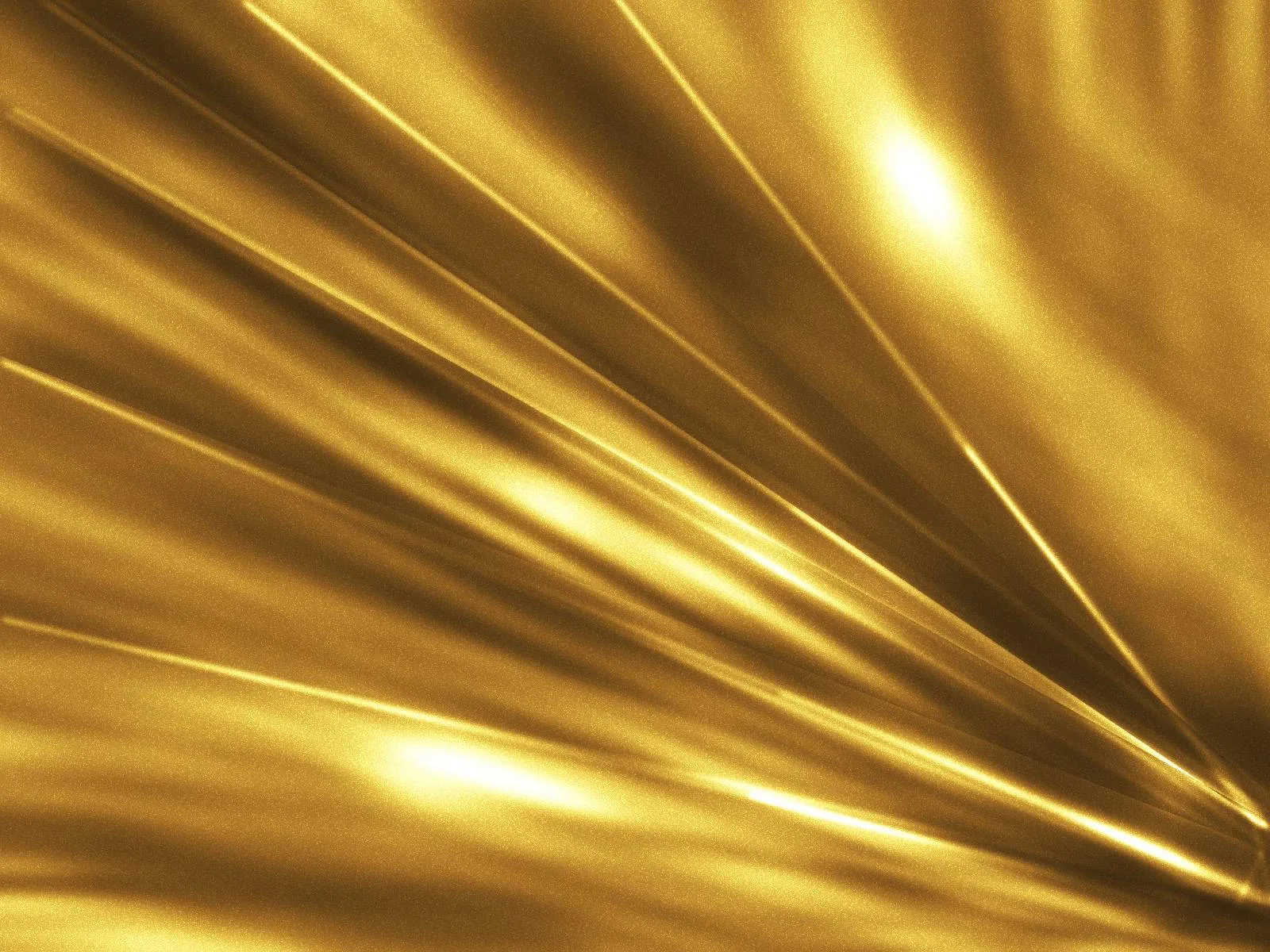 Rays of polished gold fan out from the right edge like pressed metal, catching bright highlights along each ridge.
