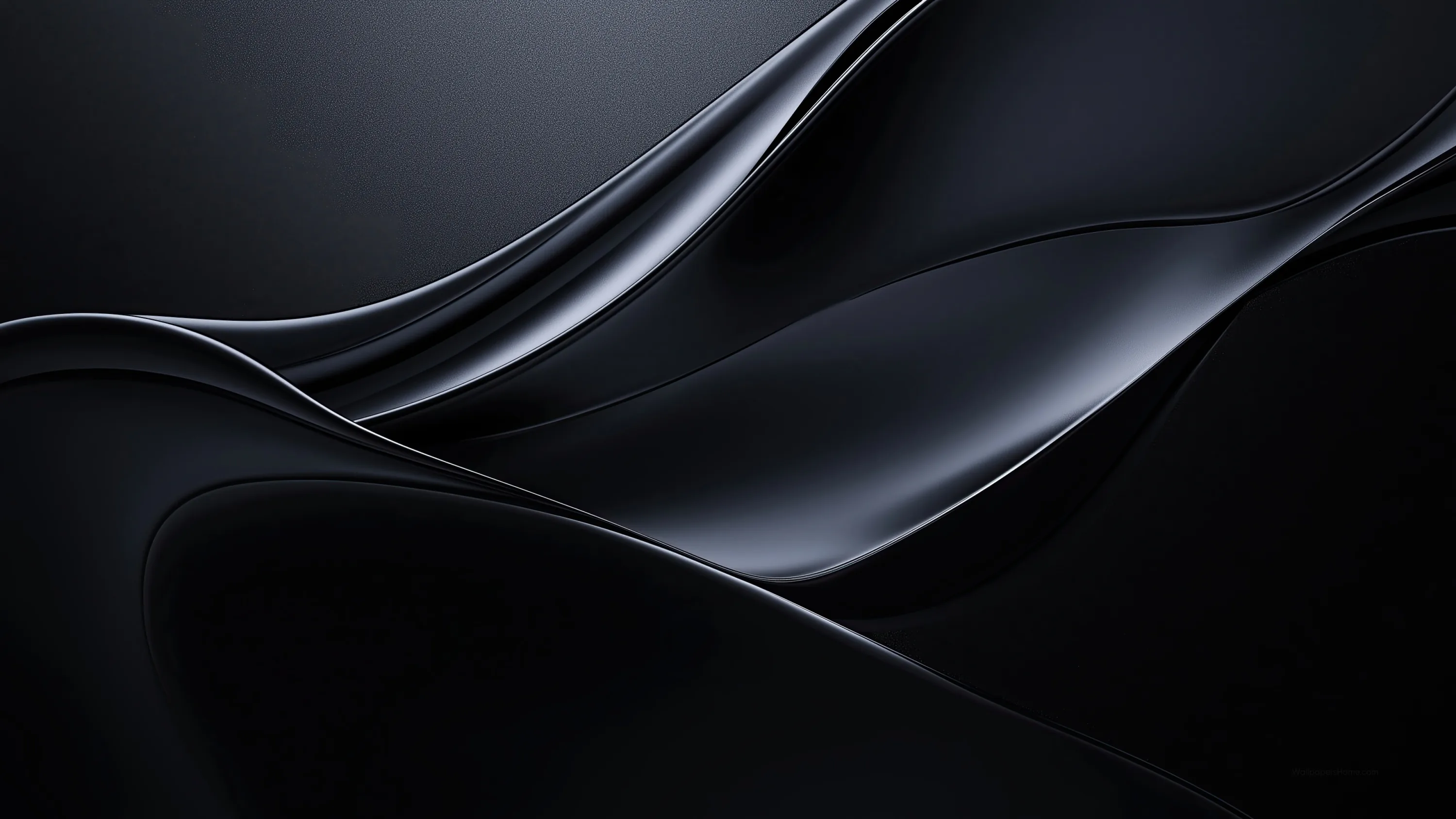 Broad satin curves fold across each other in near-black tones, one thin highlight running the length of the top edge.