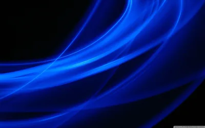 Broad ribbons of glowing blue arc across the lower two thirds of the frame while the top right corner drops into flat black.