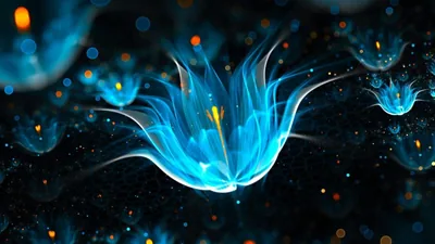A bloom of blue petals opens like a jellyfish in dark water, gold sparks at its core and blurred bokeh points scattered through the background.