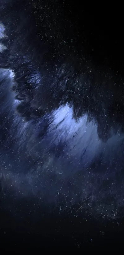 Dust lanes and star clouds fill the upper half in cold blue, the lower part fading to black where the nebula thins out.