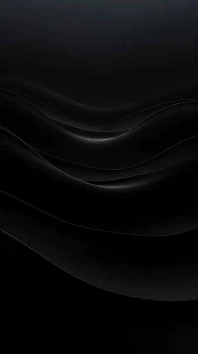 Long waves cross the frame in near-identical blacks, separated only by hairline highlights along their crests.