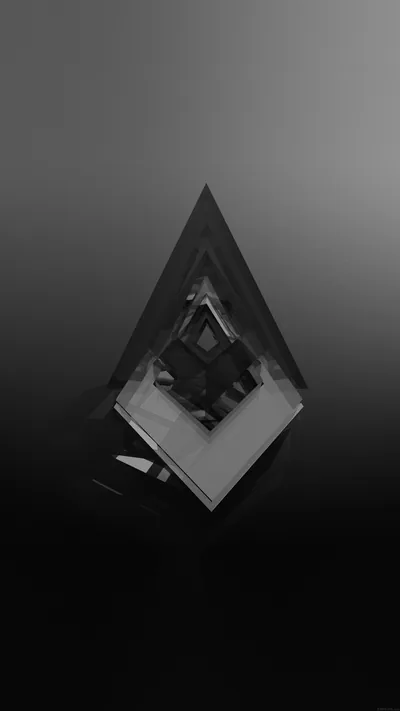 A kite-shaped shard of glass floats in the upper half of a smooth grey-to-black gradient, something dark and angular trapped inside it.