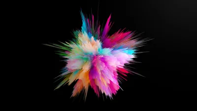 A CGI colour burst in pink, teal and gold detonates at the centre of a black frame, frozen mid-spray.