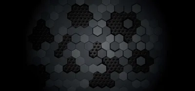 Hexagon tiles, some plain and some filled with a fine dot mesh, cluster loosely across the middle of the frame and fade into the black border.