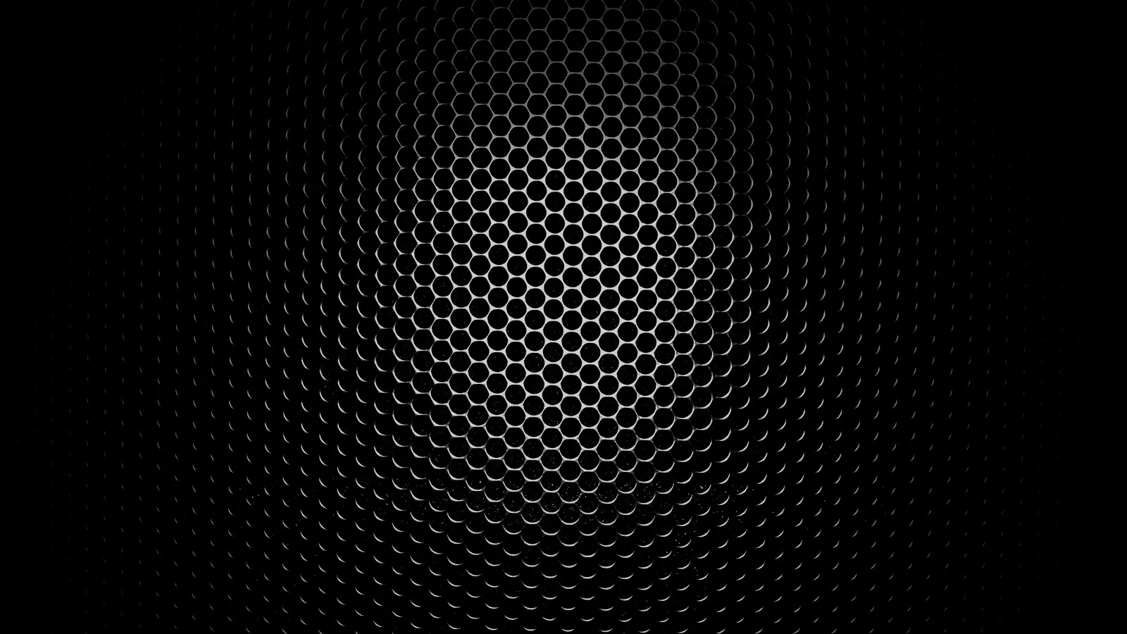 A hexagonal mesh runs across a dark panel, bright through the middle and falling into a heavy vignette at the corners.