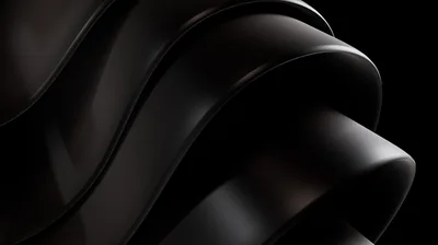 Dark folds of a glossy ribbon curl through the frame, warm brown showing where the light hits.