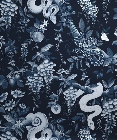 Pale blue snakes wind between grapes, pomegranates and leafy vines on a navy ground, the dense repeat leaving no single empty area for icons.