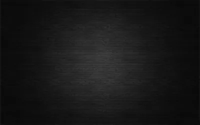 A quiet charcoal surface with fine horizontal grain and a soft vignette — made to sit behind icons without competing.