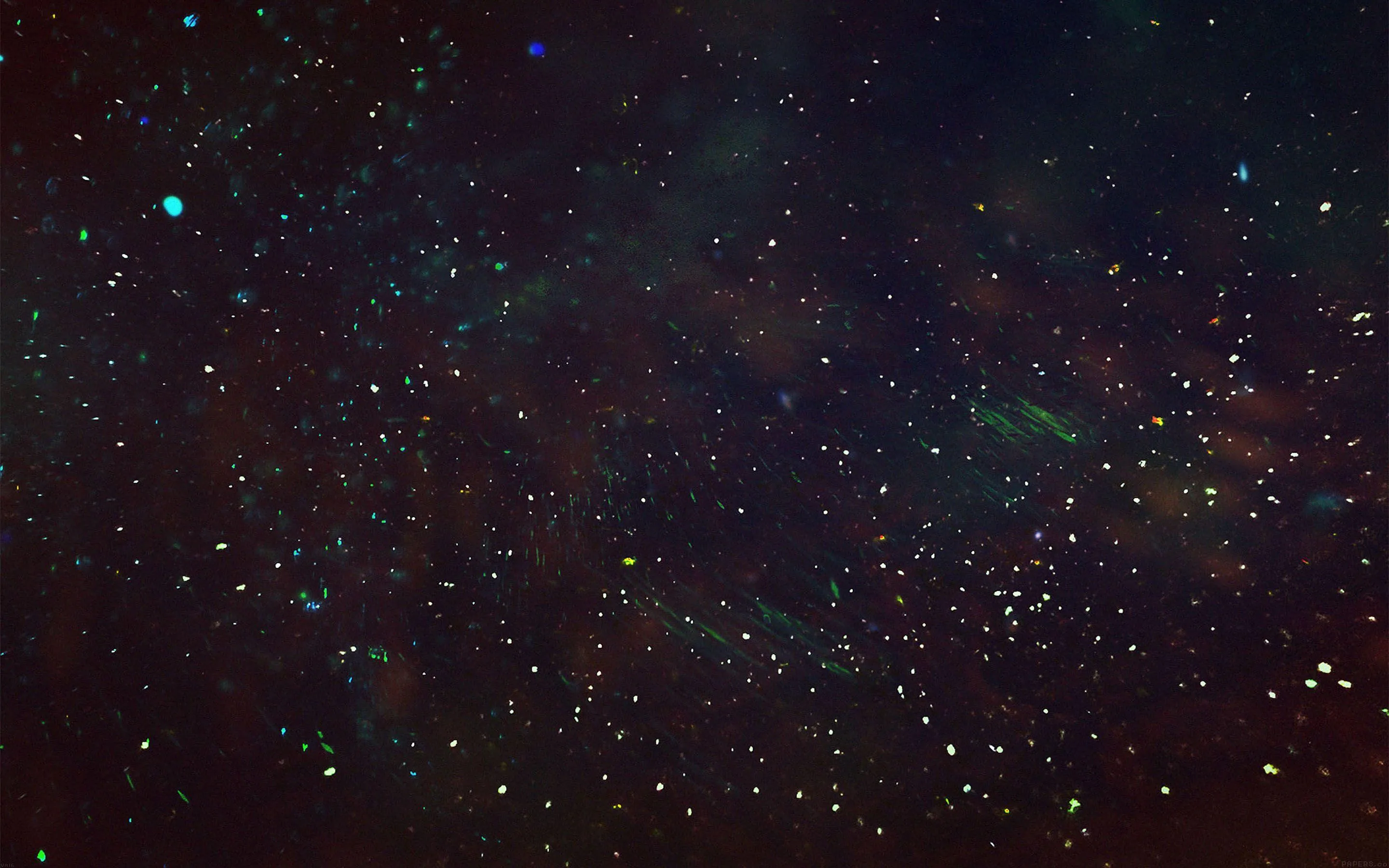 Green and blue clouds sit behind a wide spread of white points, the colour thinning out toward the darker upper corners.