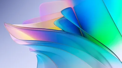 Stacked translucent blades in blue, green and pink fan toward a point at the left, the pale grey upper left staying clear for menu bars.